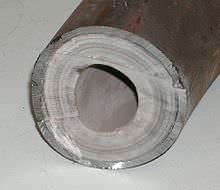 Limescale in a pipe reduces the flow of water.