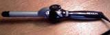 Curling Iron: Hair iron used for curling straight hair