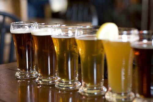 A beer sampler. The lightest is pale ale and the darkest is porter.