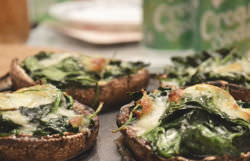 Portobello caps stuffed with mozarella, basil and tomato, Italian style