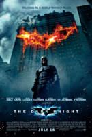 Movie poster for Batman:The Dark Knight. Batman is in the foreground with a burning building in the background. The fire in the building looks like a bat.
