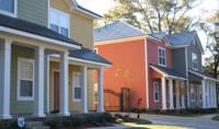 Houses with metal roofs.