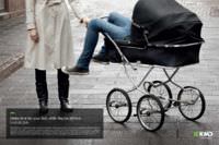 An ad with an adult's long legs dangling out of a baby's stroller. The ad urges people to spend time with their kids while they are still kids.