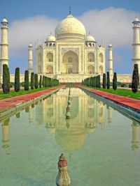The Taj Mahal is a white marble mausoleum in India.